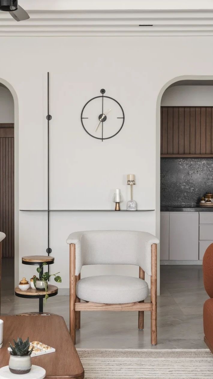 Living room opening onto the kitchen at Neutral Theme Nest Residence, Pune — interior designer in Hinjewadi and Pune, luxury home interior design